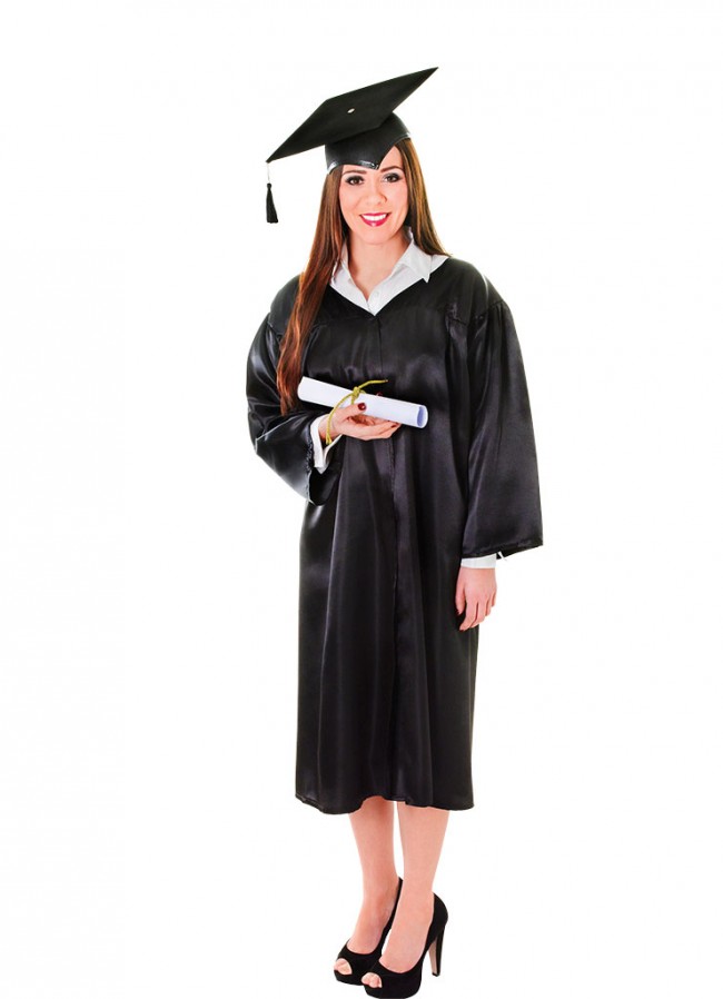 Woman holding diploma while smiling